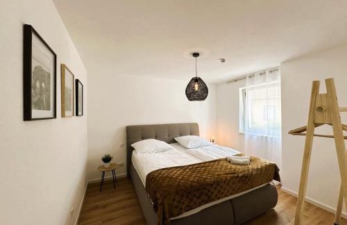 Elgersweier Apartment | AMAO Indigo - Rollstuhlgerechte Suite - 62 qm - Balkon & Tiefgarage - Aufzug - Nähe Messe - bis 10 Pers 2Whg