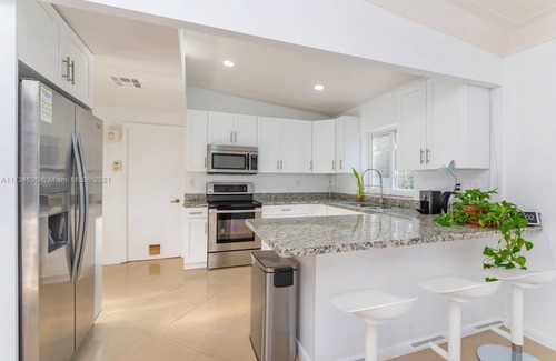 Wilton Manors House | Amazing backyard for Family vacation with heated pool.