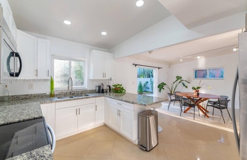Wilton Manors House | Amazing backyard for Family vacation with heated pool.