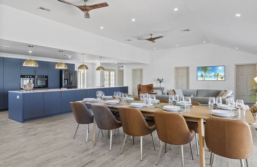 Hartswell Villa | Amazing luxury beach villas with private dock for 20 people! Large heated pools