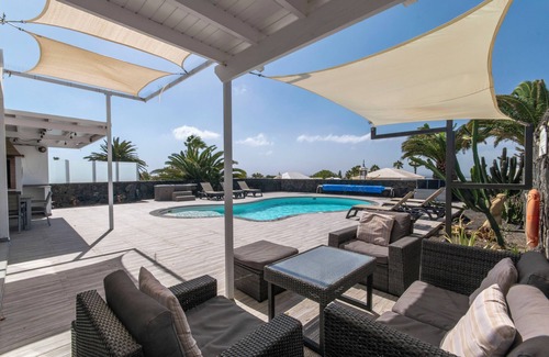 Playa Blanca Villa | Amazing sea and mountain views, heated pool and jacuzzi, airconditionn