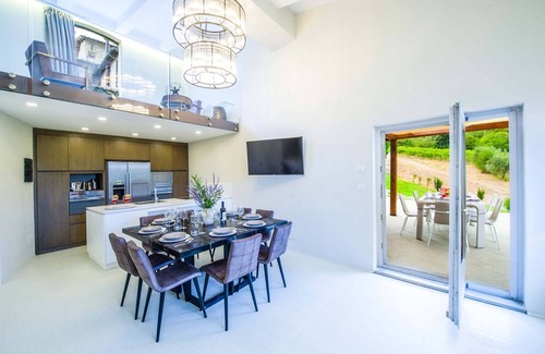 Panzano in Chianti Villa | AMORE RENTALS - Villa Bacci with Indoor Heated Pool, Garden, Terraces and Parking