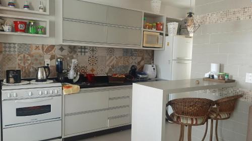 Laguna Apartment | AMPLA COBERTURA NA PRAIA DO MAR GROSSO LAGUNA