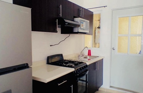 Puerto Juarez Apartment | Amplio Departamento a 10 Min de la Playa con Alberca e Internet