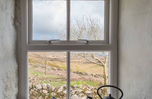 Downings Cottage | An Irish Idyll - traditional stonewall cottage nestled in hills above Downings