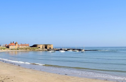 Beadnell Cottage | An open plan first floor apartment in the seaside resort of Beadnell.