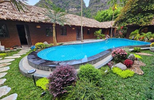 Hoa Lu Cabin | An Riverside Ecolodge