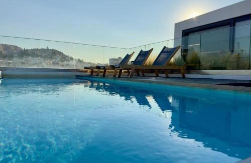 Athens Apartment | Anemoi Home - Luxe Stay with Pool & Gym by TT