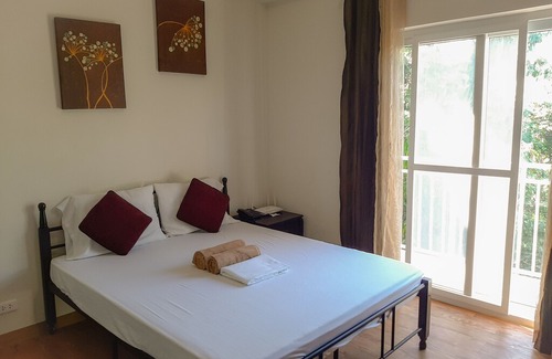 Mactan Export Processing Zone Apartment | ANIA GUEST ROOM with balcony near Mactan Airport.
