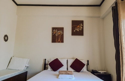 Mactan Export Processing Zone Apartment | ANIA GUEST ROOM with balcony near Mactan Airport.