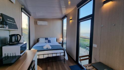 Kawaha Point House | Aorangi Peak Cabins 1 by Tiny Away