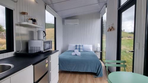 Kawaha Point House | Aorangi Peak Cabins 8 by Tiny Away