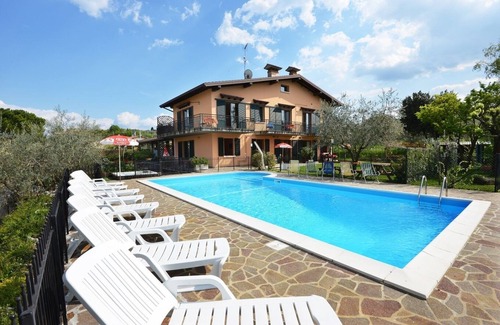 Manerba del Garda Apartment | Apartment 6 with patio, pool, soccer field and gated parking lot