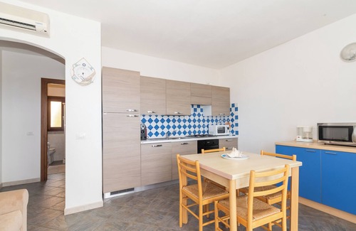 Trinita d'Agultu Apartment | Apartment 'Con Piscina 03' with Sea View, Wi-Fi and Air Conditioning