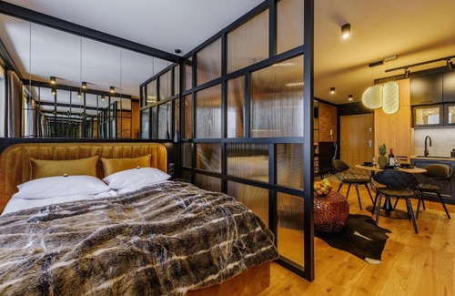 Nowy Targ Apartment | APARTAMENT CHICAGO - stylowy apartament z KLIMATYZACJĄ o bardzo wysokim standardzie w centrum miasta, z prywatnym zadaszonym parkingiem - IZBY PODHALAŃSKIE