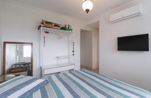 Torres House | Apartamento com 2 Dormitórios no Coração da Praia Grande - Torres/RS