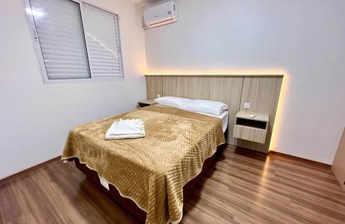 Vila Industrial Apartment | Apartamento Inteiro - 2 Quartos com AC - Wifi 1000mb - Piscina - 1 Vaga de Garagem - Elevador - Sacada Gourmet - Indicado para Grupos, Hospedes a Trabalho, Família e Pets