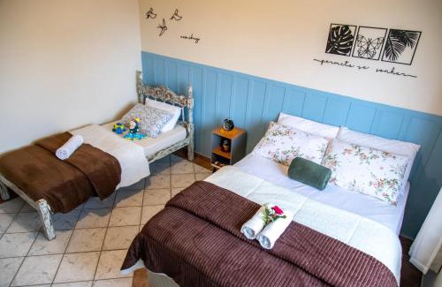 Laguna Apartment | Apartamentos exclusivos e equipado com varanda ou terraço com Pôr do sol, cozinha privativa, Wi-Fi 600MBs, a 700m da praia de Itapirubá e 1km da BR-101