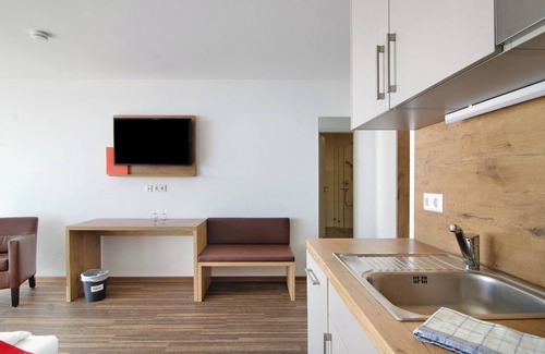 Immenstaad am Bodensee Apartment | Apartment 'A1 1 Obergeschoss Nummer 12' with Shared Terrace, Shared Garden and Wi-Fi