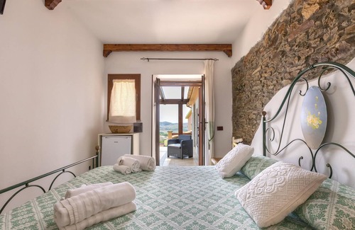 Sassari Apartment | Apartment "App 4 Posti con Terrazza Vista Mare" with Sea View, Pool, Wi-Fi, Garden & Terrace