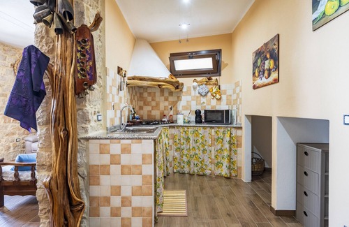 Baunei Apartment | Apartment 'Appartamento Domm'e Orrosaria' with Mountain View, Balcony and Air Conditioning