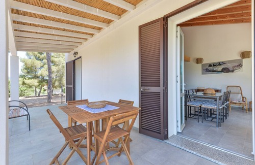 Madonna delle Grazie Apartment | Apartment 'Artistica 5' with Sea View, Shared Terrace and Air Conditioning