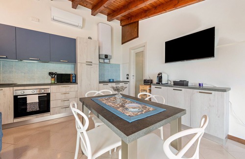Gargnano Apartment | Apartment 'Blu' with Lake View, Shared Terrace and Wi-Fi