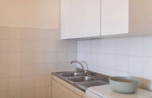 Trinita d'Agultu e Vignola Apartment | Apartment "Casa Spiaggia Molo 4" on Isola Rossa with Sea view & Balcony