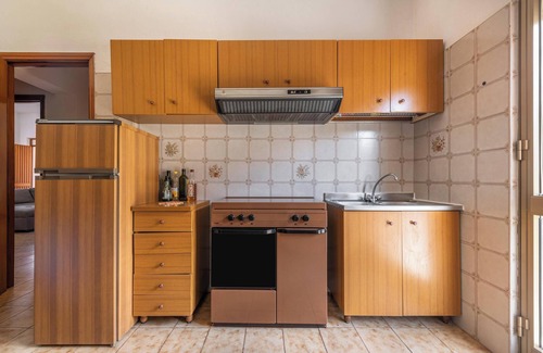 Teulada Apartment | Apartment 'Casa Vacanze Teulada' close to Historic Centre with Garden & Wi-Fi