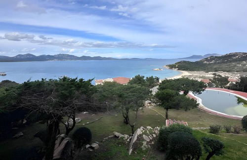 Li Cuncheddi Apartment | Apartment 'Casa Vacanze Ribes' with Sea View, Shared Pool and Private Terrace