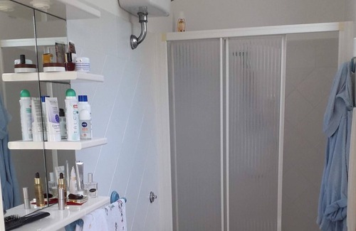 Portoscuso Apartment | Apartment 'Casetta Silvia' with Shared Pool, Private Terrace and Air Conditioning