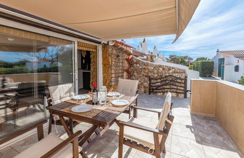 Cap d'Artrutx Apartment | Apartment 'Casita del Faro' with Shared Pool, Wi-Fi and Air Conditioning
