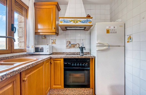 Orba Apartment | Apartment 'Cavall Vert' with Mountain View, Wi-Fi and Air Conditioning