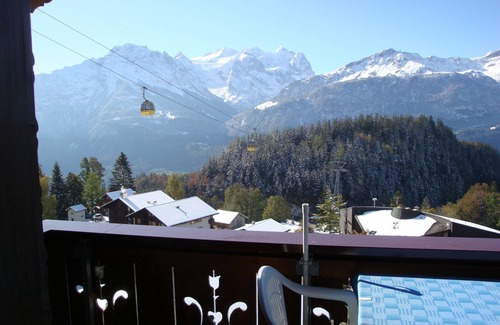 Hasliberg Wasserwendi Apartment | Apartment with a panoramic view of the mountains, glaciers and Lake Brienz