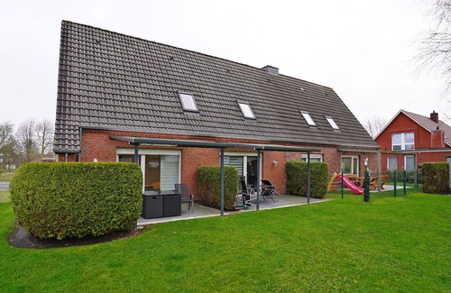Norddeich Apartment | Apartment 'Deichkieker' with Shared Garden and Wi-Fi