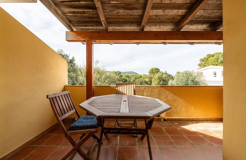 Porto Pino Apartment | Apartment 'Ella' with Private Terrace, Private Garden and Balcony