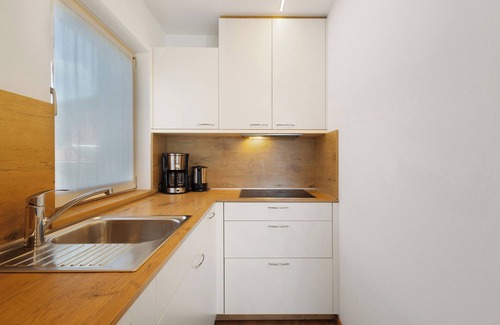 Rasa Apartment | Apartment 'Enzian' with Mountain View, Shared Garden and Wi-Fi