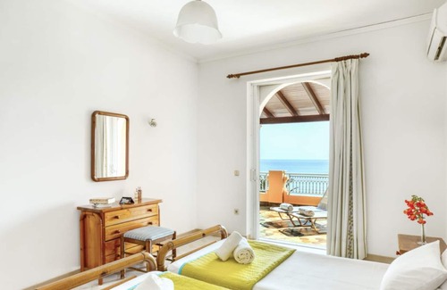 Agios Georgios Pagon Apartment | Apartment for 3 people - with a beautiful sea view just 50m from the beautiful sandy beach