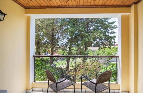 Ag. Georgios Apartment | Apartment 'Fedra Two-Bedroom Bungalow' with Shared Pool, Wi-Fi and Air Conditioning