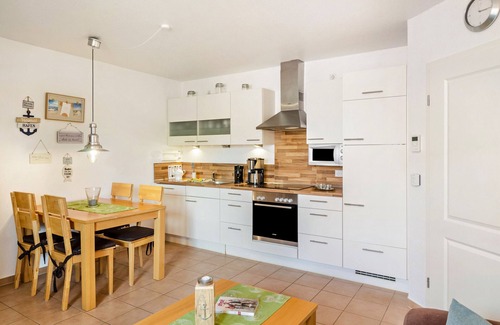 Norddeich Apartment | Apartment 'Ferienwohnung Neue Sande' with Private Garden, Balcony and Wi-Fi
