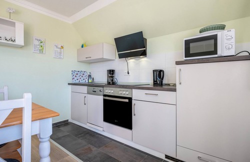 Bredstedt Apartment | Apartment 'Ferienwohnung Am Wind' with Private Terrace, Balcony and Wi-Fi
