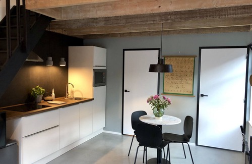 Heerlen Apartment | Apartment for two people in renovated former primary school with lovely garden.