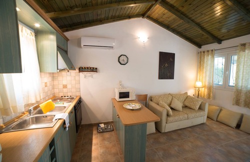 Ag. Georgios Apartment | Apartment 'Frini One-Bedroom' with Shared Pool, Wi-Fi and Air Conditioning