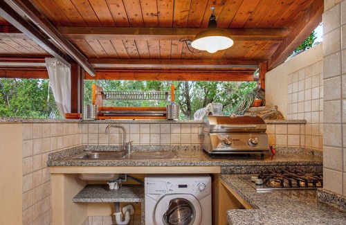 Tiriddo Apartment | Apartment Ginepri 50m from the beach, with Garden & Wi-Fi