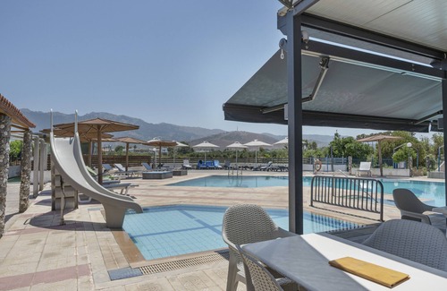 Tingaki Apartment | Apartment 'Golden Sun Two-bedroom Apt 1' with Sea View, Shared Pool and Wi-Fi