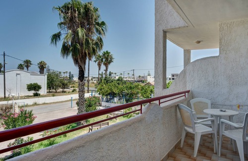 Tingaki Apartment | Apartment 'Golden Sun Two-bedroom Apt 2' with Sea View, Shared Pool and Wi-Fi