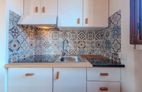 Porto Istana Apartment | Apartment 'I Sugheri' with Private Terrace, Private Garden and Air Conditioning