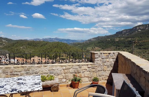 Pauls House | Apartment In A Hotel 'Casa Rural Cal Puyo' with Mountain View, Wi-Fi and Air Conditioning