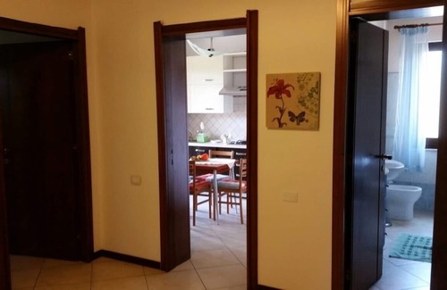 Su Forti House | Apartment in villa with garden, near the sea