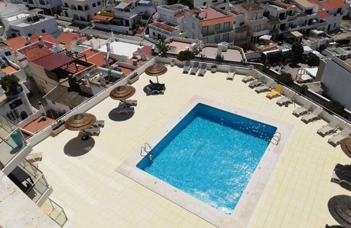 Olhos D'Agua Apartment | Apartment in Olhos de Água with Breathtaking Views Of The Private Pool & Beach